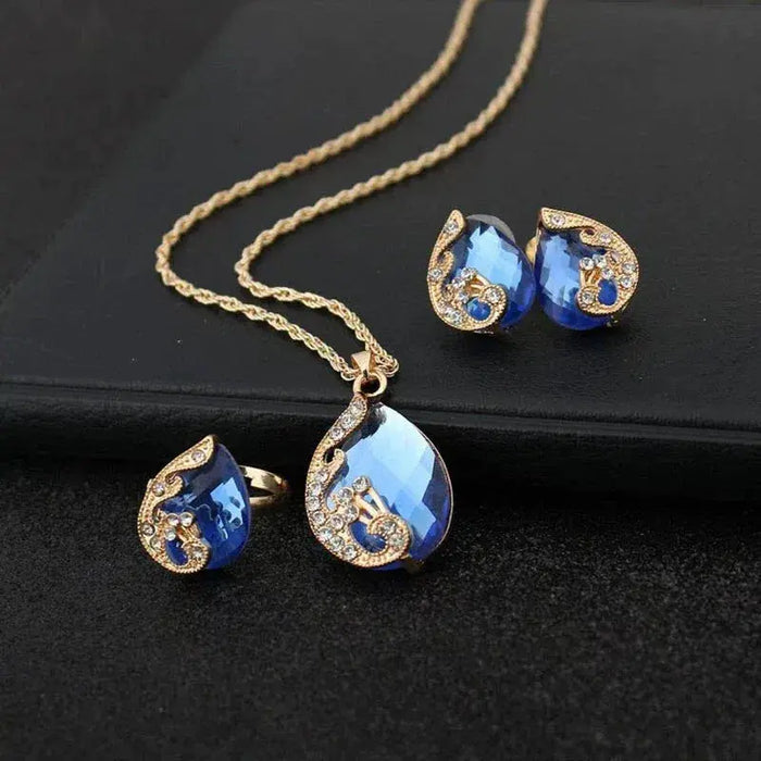 Gold Necklace and Earring Set with Blue Crystal