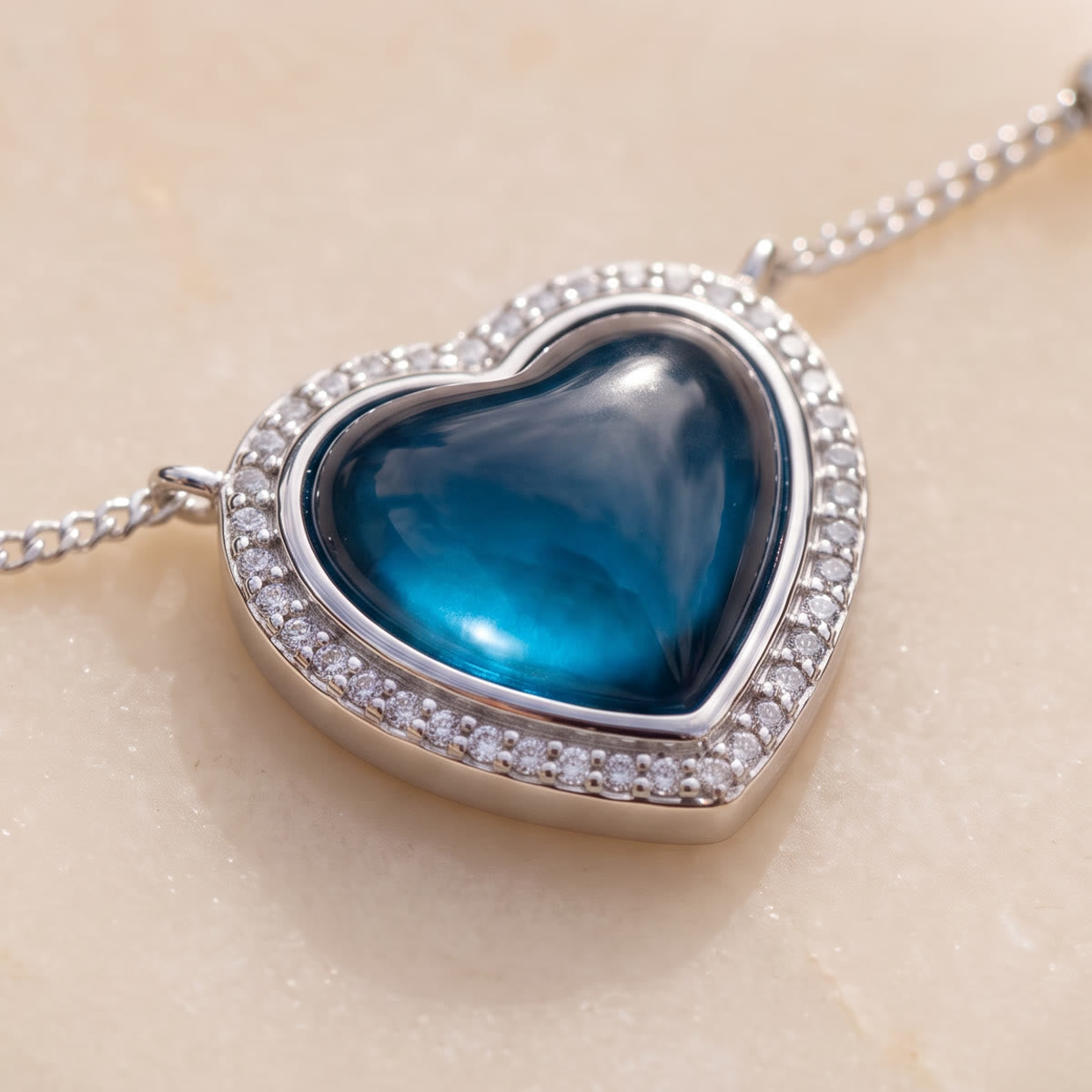 Mood heart pendant glowing blue
