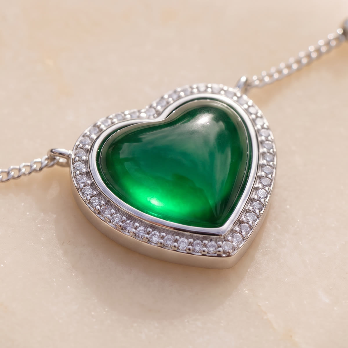 Mood heart pendant glowing emerald